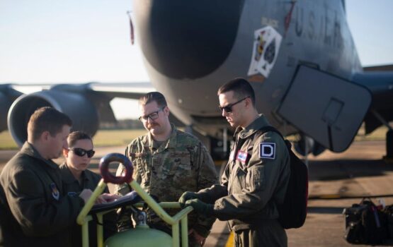 Airmen from the 351st Air Refueling Squadron and 100th Aircraft Maintenance Squadron review a checklist prior to a flight at RAF Mildenhall, England, December 4, 2019. US Air Force/Tech. Sgt. Emerson Nuñez